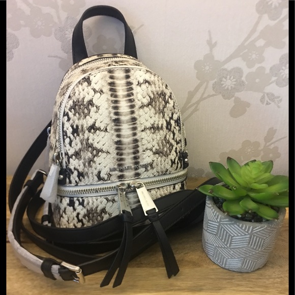 Michael Kors Handbags - Michael Kors Rhea Zip XS Messenger Backpack